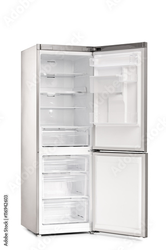 Vertical shot of a new empty refrigerator