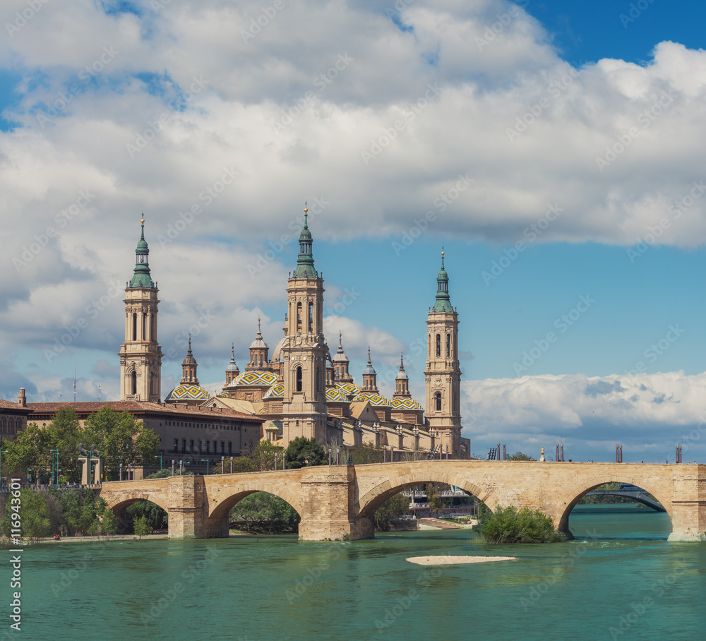 Basilica Our Lady Pillar In Zaragoza With The Bridge And River