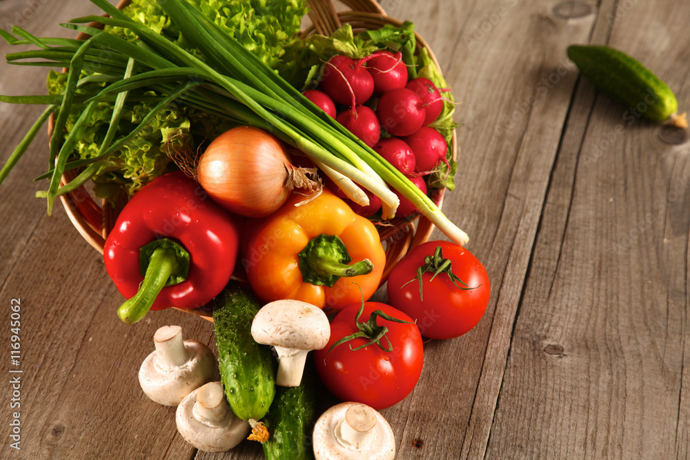 Fresh vegetables on a clean wooden table Fresh vegetables on a clean wooden table