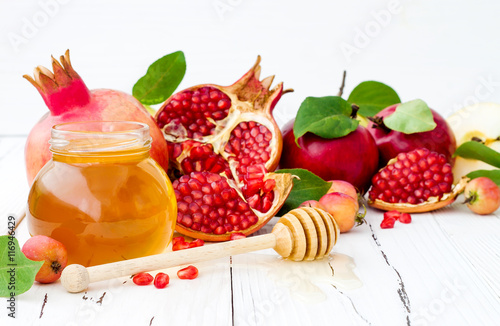 Apple and honey, traditional food of jewish New Year - Rosh Hashana. Copy space background © sveta_zarzamora