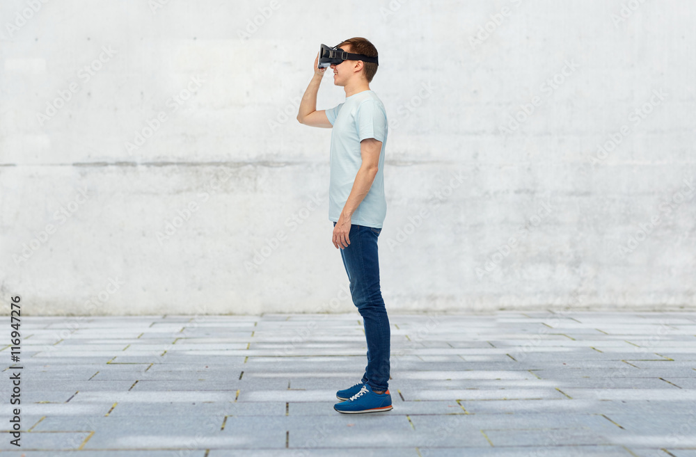 happy man in virtual reality headset or 3d glasses happy man in virtual reality headset or 3d glasses