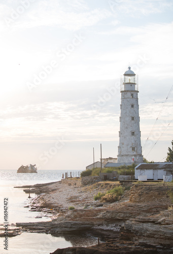Lighthouse stands on the beach