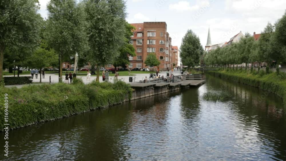Wide shoot of beautiful river bank in center of Aarhus with subtle slide Wide shoot of beautiful river bank in center of Aarhus with subtle slide