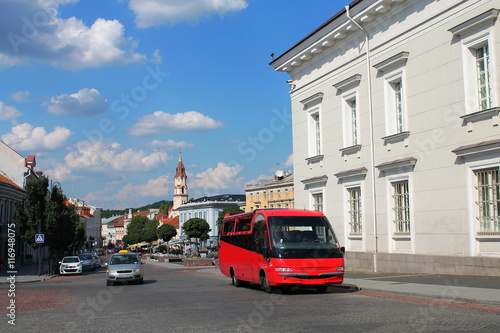 Red tourist bus in Old Town,Vilnius,L © vladuzn