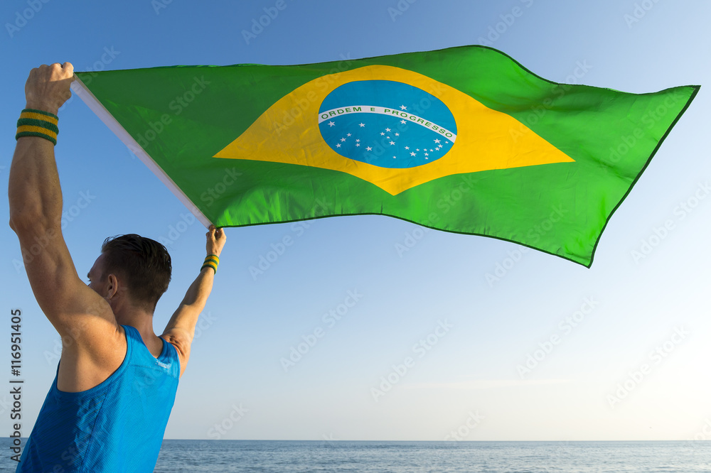 Brazilian Athlete Holding Brazil Flag Flying In The Wind Over The Sunset Beach Shore In Rio De Janeiro Stock Photo Adobe Stock Brazilian Athlete Holding Brazil Flag Flying In The Wind Over The Sunset Beach Shore In Rio De Janeiro Stock Photo Adobe Stock
