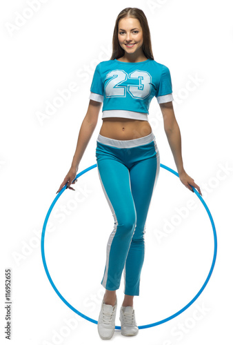 Young sporty woman with hoop