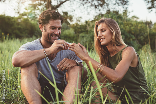 Man proposing to girlfriend on holiday