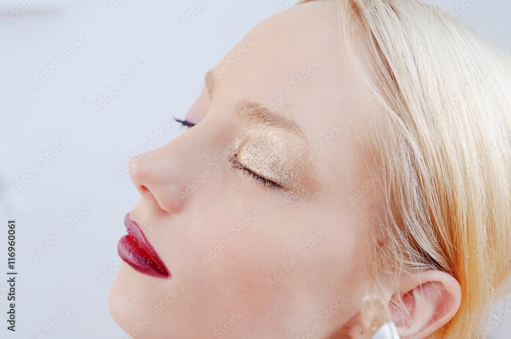Eye makeup artist applying eyeshadow - obrazy, fototapety, plakaty 