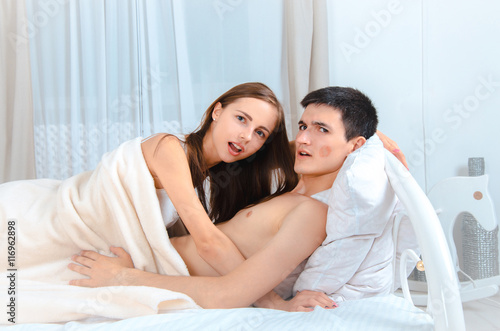 young couple in love under the blanked