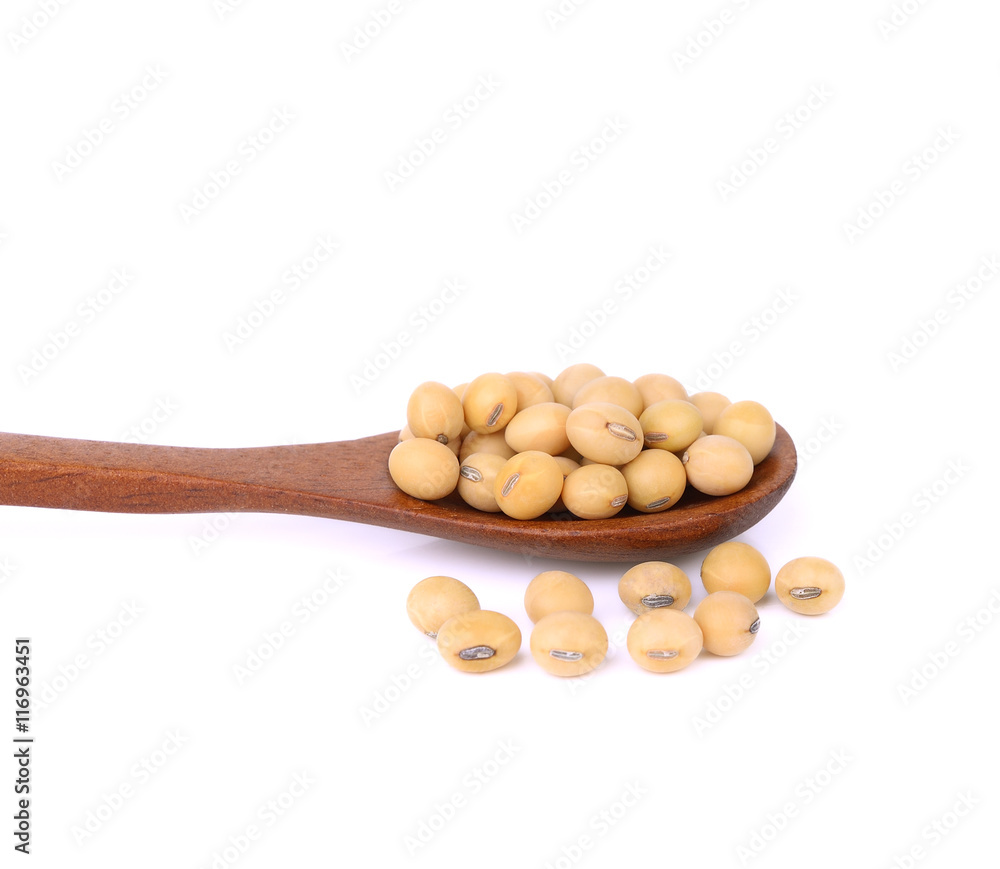 soy beans in wooden spoon on white background soy beans in wooden spoon on white background