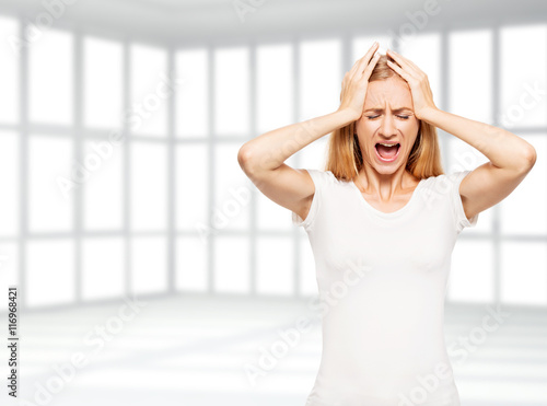 Young hysterics female in office