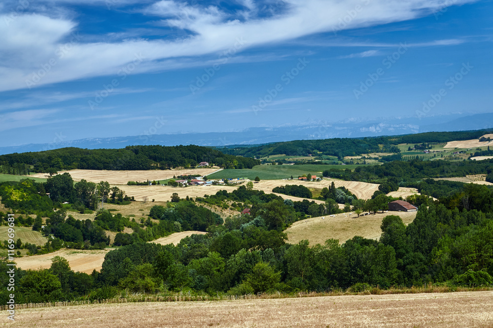 Agricultural landscape in the foothills in central France.