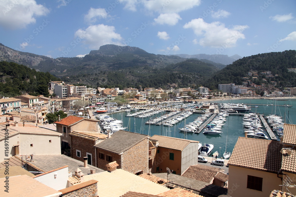 Puerto de Soller Port of Mallorca with boats in balearic island, Tramuntana mountains