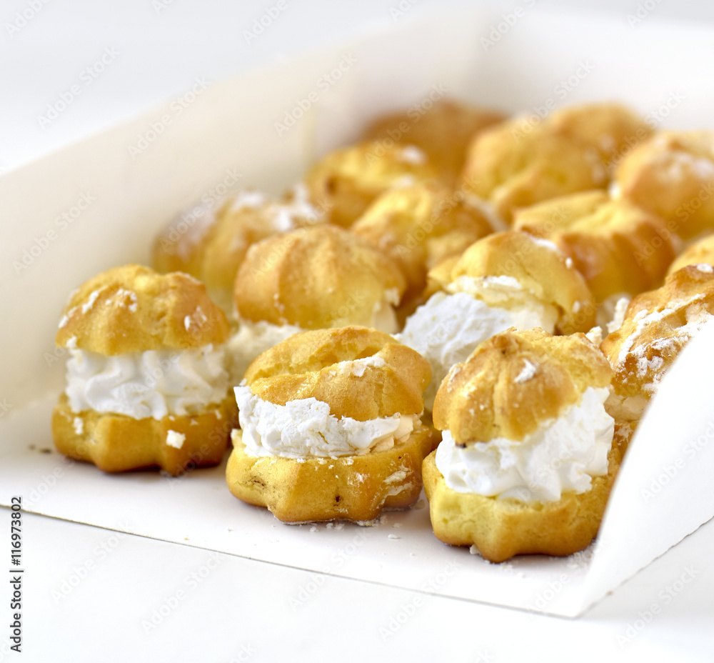 Cream puffs in a white box Cream puffs in a white box