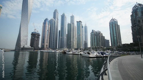 Dubai - AUGUST 7, 2014: Skyscrapers at Dubai Marina on August 7 in Dubai, UAE. Dubai Marina has very high concentration of skyscrapers