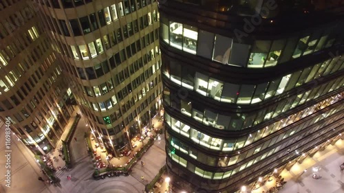 White square modern business center. Moscow Russia. Night illumination. Unique aerial shot. Office windows. Steel and glass reflections. photo