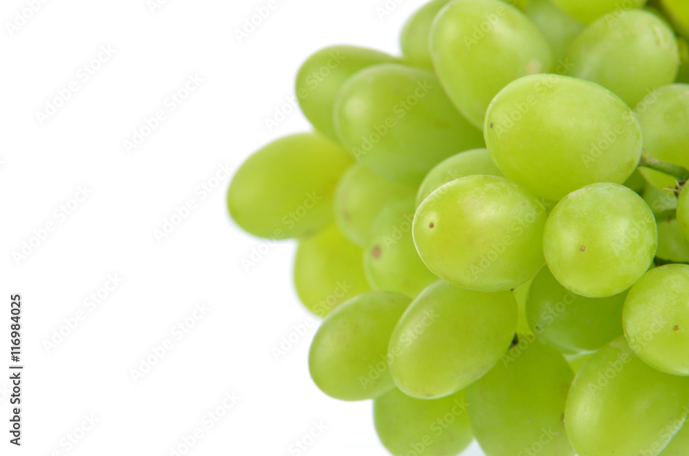 Green grapes isolated on white