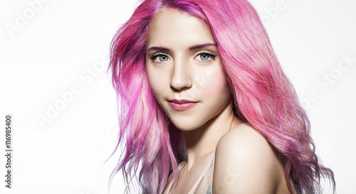 beautiful girl with fluttering hair color pink