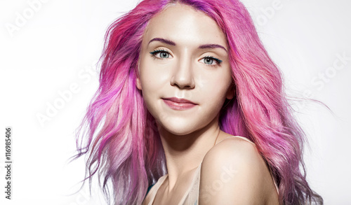 beautiful woman with fluttering hair color pink