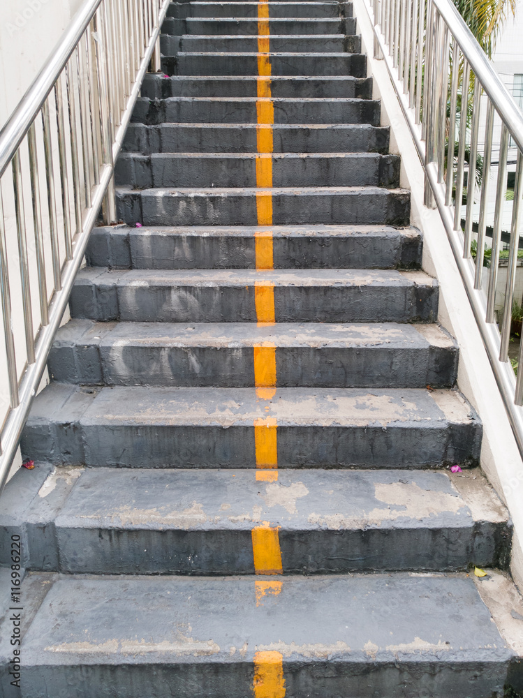 Stair for pedestrian overpass with yellow line Stair for pedestrian overpass with yellow line