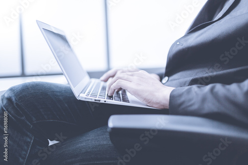 working on laptop, close up of hands of business man