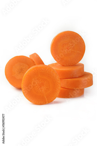 Fresh sliced carrots on white background