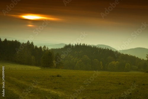 Hills and forest at autumn sunrise © Photo Collective