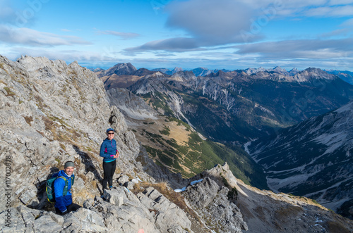 Man and woman mountaineering in Allgau Alps near Oberstdorf, Germany