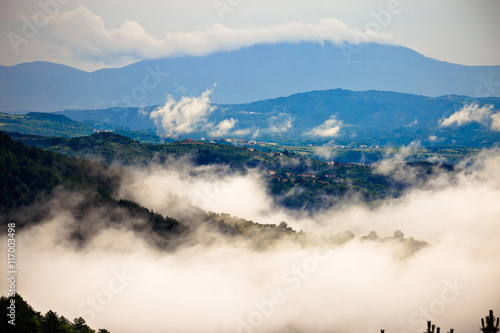 Hills and landscape in fog morning view © xbrchx