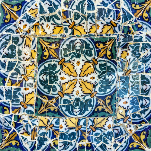 Broken glass mosaic tile, decoration in Park Guell, Barcelona, S photo