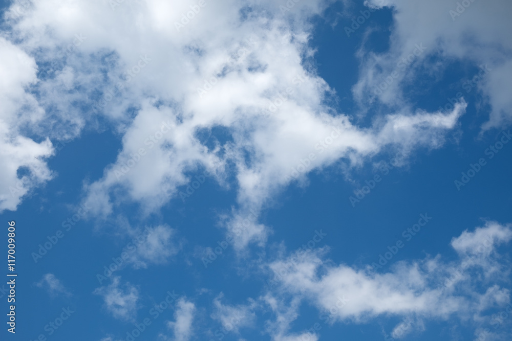 blue sky background with tiny clouds blue sky background with tiny clouds