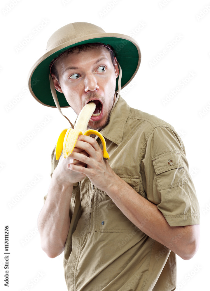Ταπετσαρία Explorer in pith helmet eating banana
