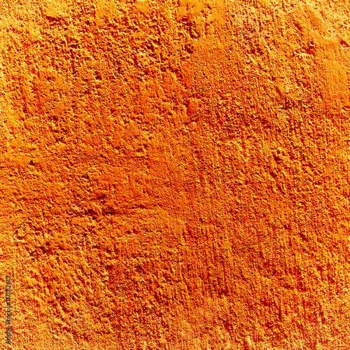 Texture orange plastered wall for background