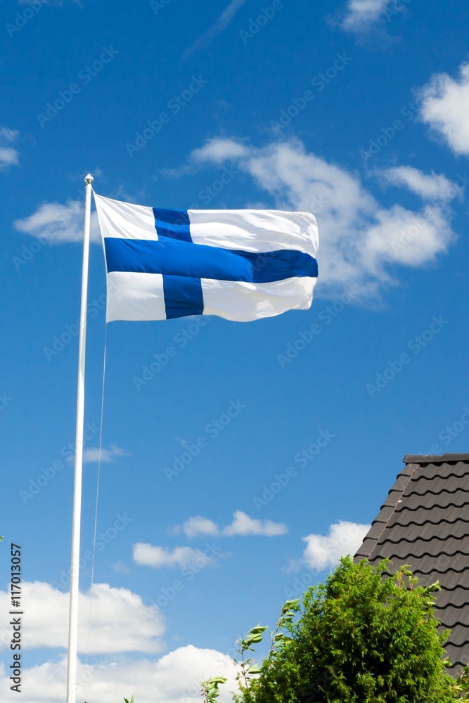 Flag of Finland on blue sky background.