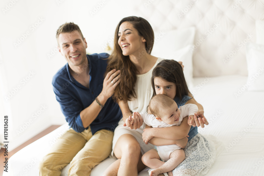 Young family in the room Young family in the room