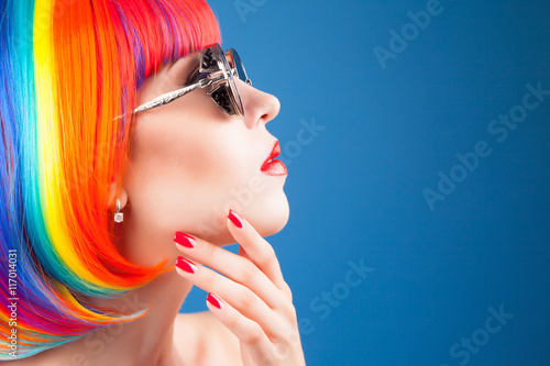 beautiful woman wearing colorful wig