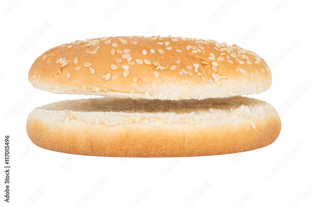 Bun with sesame cut isolated on white background Bun with sesame cut isolated on white background