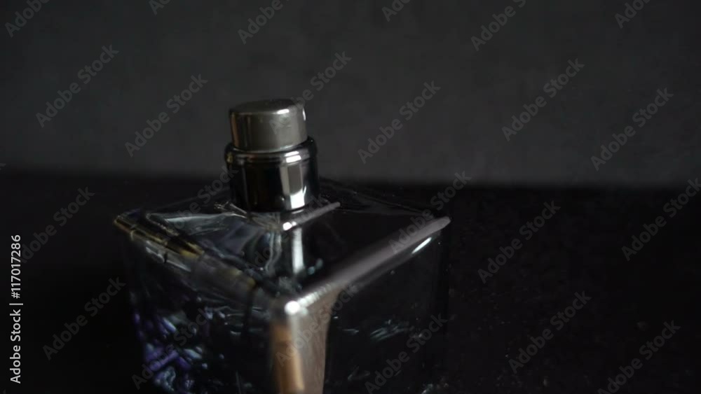 Slow motion video of perfume sprayed Slow motion video of perfume sprayed