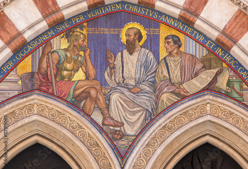 ROME, ITALY - MARCH 24, 2015: The mosaic Teaching of St. Paul in carcer by George Breck (1909) on the main portal of church Chiesa di San Paolo dentro le Mura.