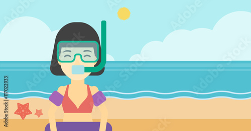 Woman with snorkeling equipment on the beach. © Visual Generation