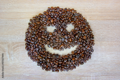 coffee beans spread out in the form of a smile photo