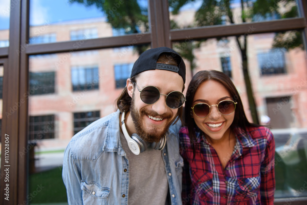 Cool guy and girl relaxing outdoors Cool guy and girl relaxing outdoors
