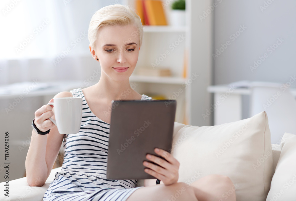 Woman looking at the tablet Woman looking at the tablet