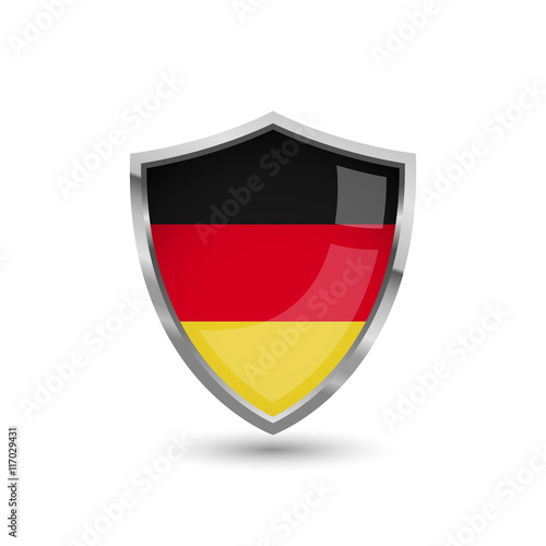 National flag of Germany. Flag on the metal shield with glare.