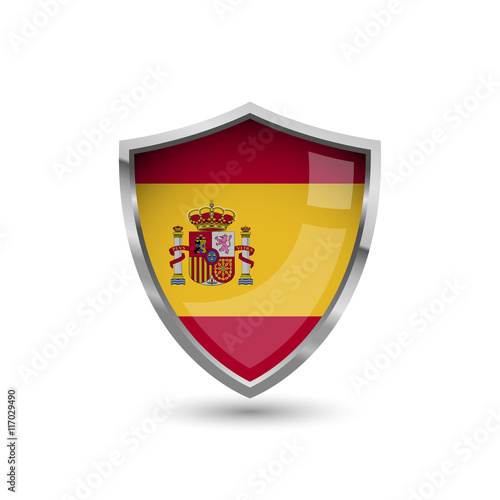 National flag of Spain. Flag on the metal shield with glare.