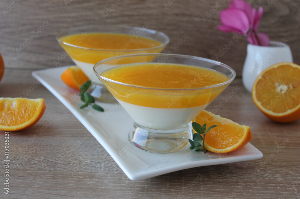 orange panna cotta with slices of oranges orange panna cotta with slices of oranges