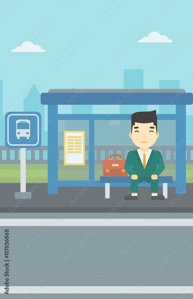 Man waiting for bus at the bus stop. Man waiting for bus at the bus stop.