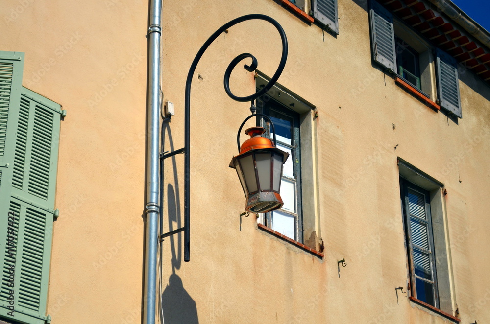 old lantern in french city during sunshine old lantern in french city during sunshine