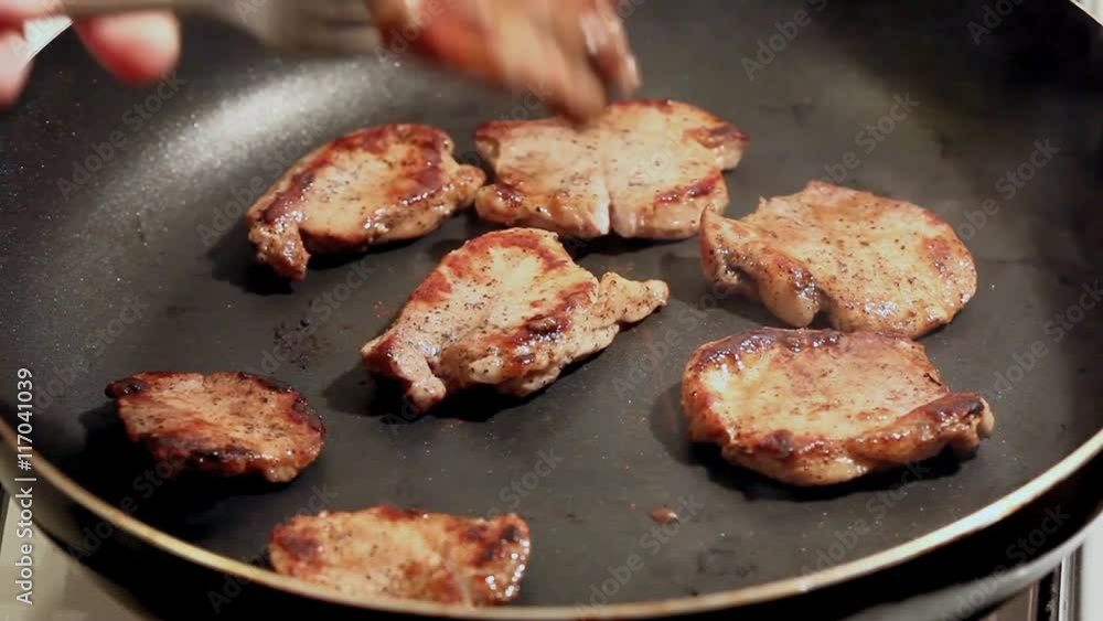 fry the meat in a frying pan, Chef preparing and spicing meat restaurant kitchen fry the meat in a frying pan, Chef preparing and spicing meat restaurant kitchen