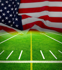 Football field stadium with American flag background